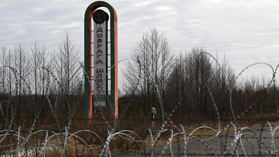 A sign reads "Bon Voyage" at the Divin border crossing point between Belarus and Ukraine on February 15, 2023.