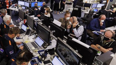 New Zealand emergency agency staff work in the National Coordination Center in the aftermath of Cyclone Gabrielle.