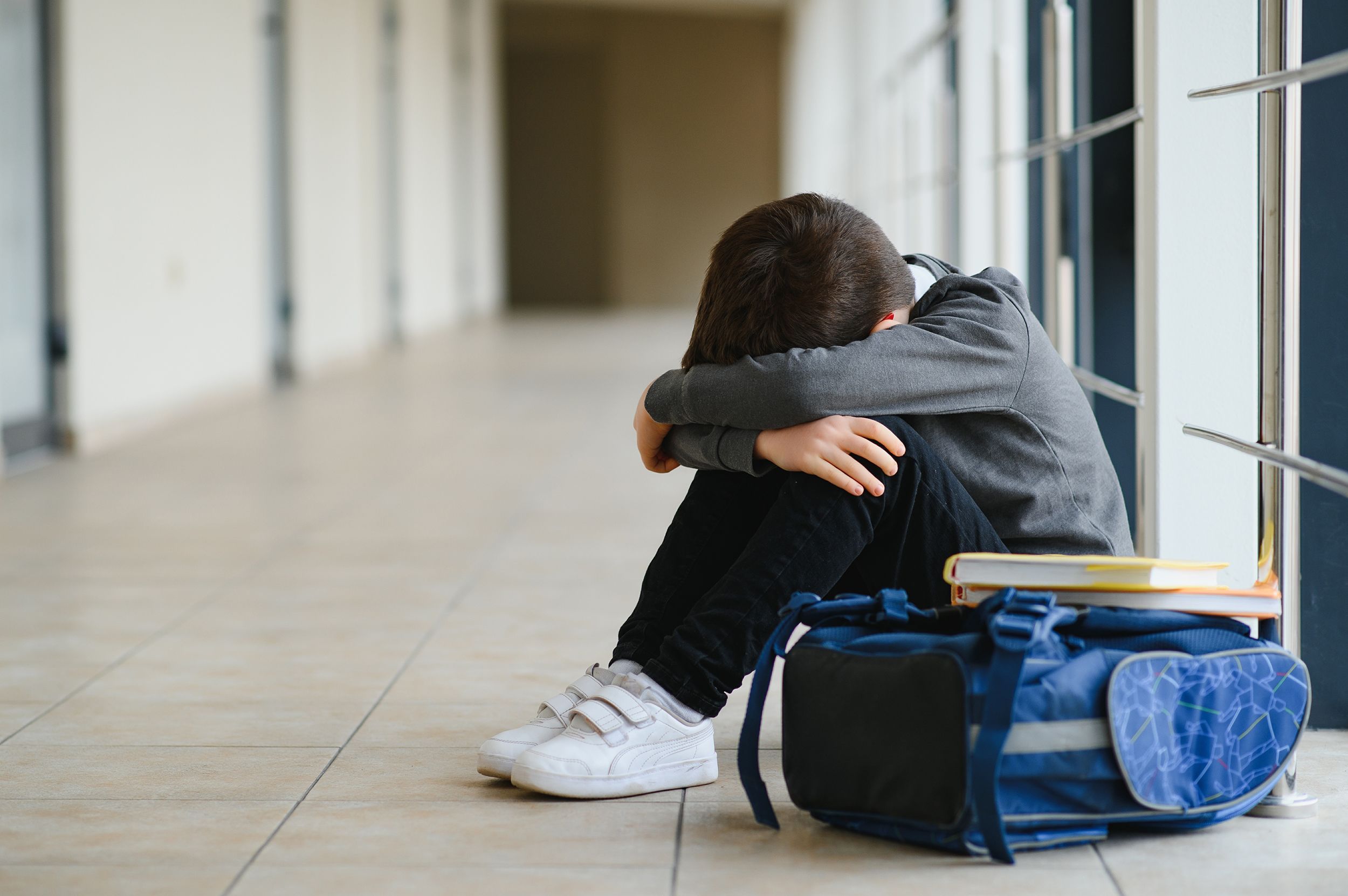 Profile Of A Sad Schoolgirl With A Backpack Tired Child Stock