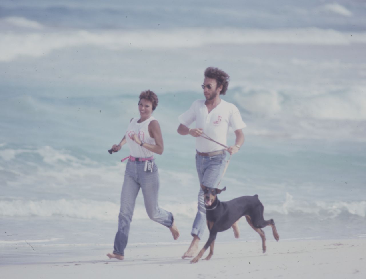 Welch and Weinfeld are seen running together during a Barbara Walters TV special in 1985.