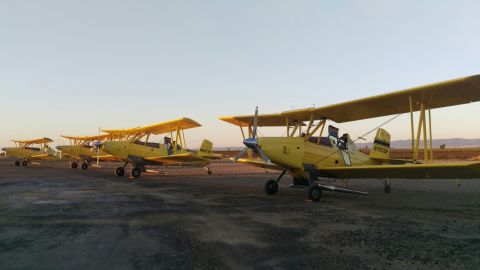 Richter Aviation planes waiting for takeoff in 2021, in Maxwell, CA. The company says that its business has plunged by more than half since the start of the drought.