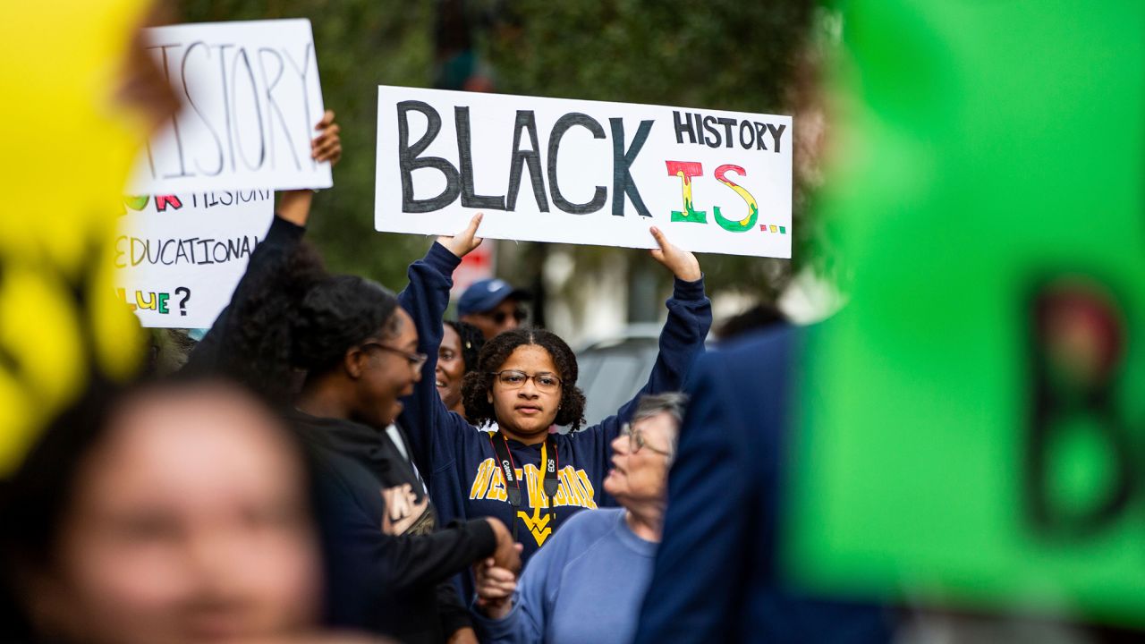 Hundreds participate in the National Action Network demonstration on February 15 in response to Florida Gov. Ron DeSantis' rejection of an AP African American studies course.