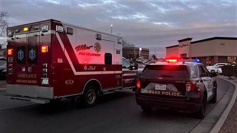 An El Paso Fire Department ambulance and a police vehicle are shown at Cielo Vista Mall after a shooting was reported.