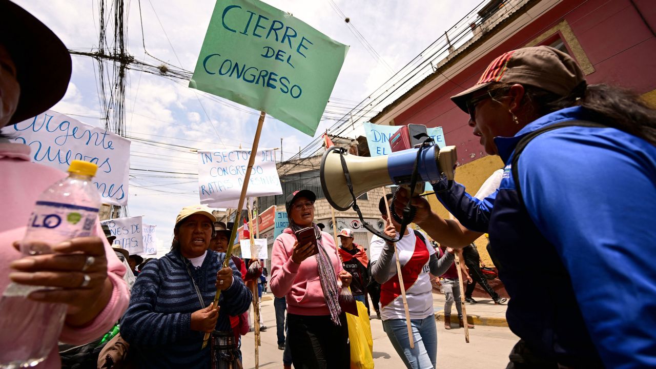 Supporters of former President Pedro Castillo march during a protest in Abancay, Peru, on December 20, 2022. 