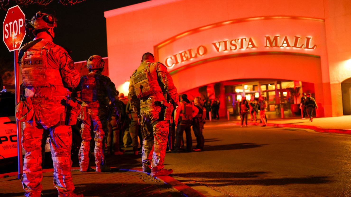 Law enforcement members gather outside the Cielo Vista Mall in El Paso, Texas.