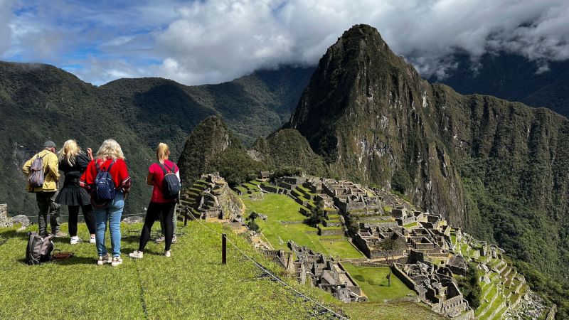 NextImg:Machu Picchu reopens for the first time after protests | CNN
