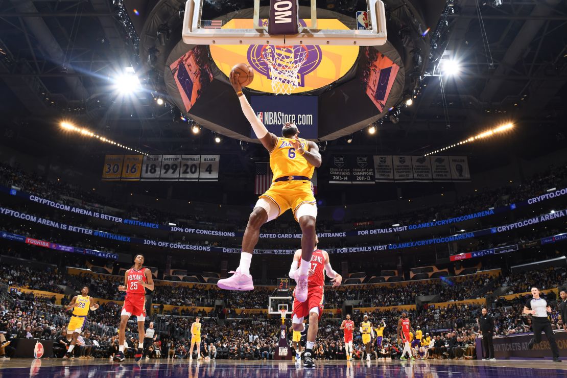 LeBron James drives to the basket during the game against the Pelicans.