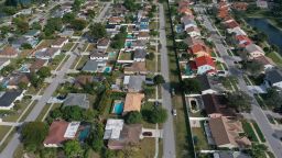 In an aerial view, homes sit on lots in a neighborhood on January 26, 2023 in Pembroke Pines, Florida. 