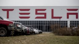 Vehicles sit parked outside the Tesla Inc. solar panel factory in Buffalo, New York, U.S., on Wednesday, Dec. 26, 2018. 