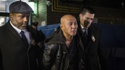 Weng Sor is walked by New York Police Department detectives out of the 68th Precinct in the Brooklyn borough of New York, Tuesday, Feb. 14, 2023. Sor was charged Tuesday with murder and attempted murder after he went on a deadly rampage with a U-Haul truck a day earlier in New York City. (AP Photo/Stefan Jeremiah)