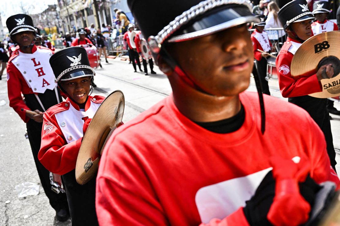 A marching band performs in a February 2022 parade in New Orleans during Carnival celebrations in advance of Mardi Gras. Music is a huge part of the festivities.