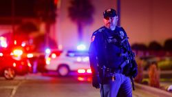 A law enforcement member looks on outside the Cielo Vista Mall after a shooting, in El Paso, Texas, U.S February 15, 2023.