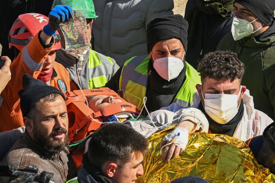 Aleyna Olmez is rescued alive from the rubble of a collapsed apartment in Kahramanmaras in southern Turkey, on February 16, 2023.