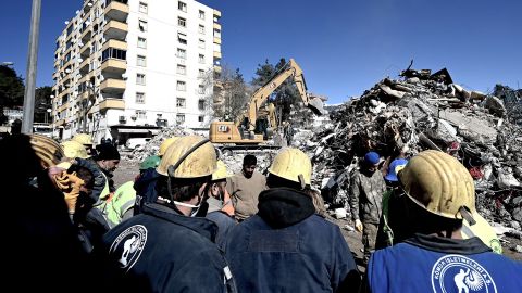 Rescue team miners gathered after Elena Olmez, who was dubbed 