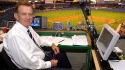 FILE -  Baseball announcer Tim McCarver poses in the press box before the start of Game 2 of the American League Division Series on Oct. 2, 2003 in New York. McCarver, the All-Star catcher and Hall of Fame broadcaster who during 60 years in baseball won two World Series titles with the St. Louis Cardinals and had a long run as the one of the country's most recognized, incisive and talkative television commentators, died Thursday morning, Feb. 16, 2023, in Memphis, Tenn., due to heart failure, baseball Hall of Fame announced. He was 81.  (AP Photo/Kathy Willens, File)