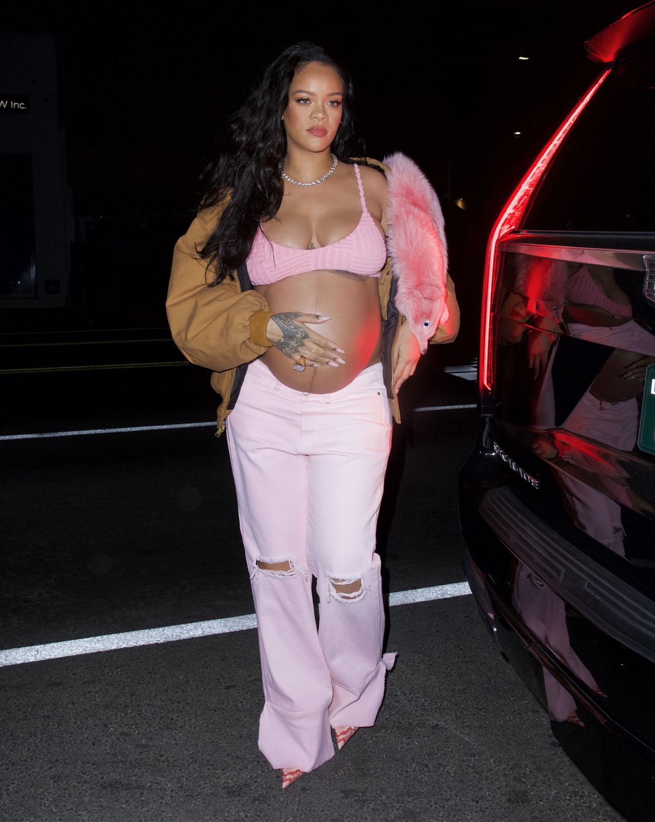 A month before giving birth to her son, Rihanna attended the birthday party of close friend Melissa Forde in a pastel pink Bottega Veneta bralette and low rise baby pink Vetement jeans.