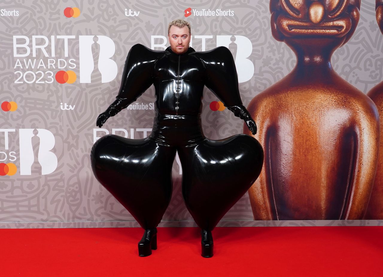 Singer Sam Smith walks the red carpet in an <a href="https://www.cnn.com/style/article/sam-smith-brit-awards-outfit/index.html" target="_blank">inflatable latex jumpsuit</a> before the Brit Awards in London on Saturday, February 11.