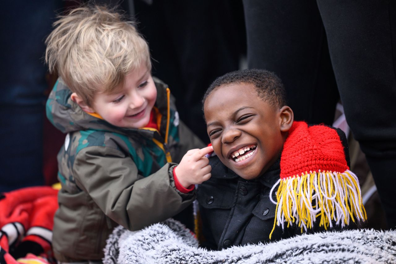 A couple of young Kansas City Chiefs fans have fun while waiting for the Chiefs' <a href="https://www.cnn.com/2023/02/15/sport/kansas-city-chiefs-super-bowl-parade-spt-intl/index.html" target="_blank">Super Bowl parade</a> on Wednesday, February 15.