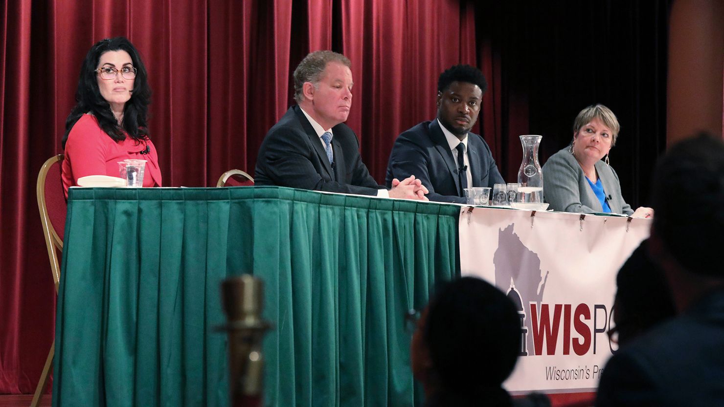 Wisconsin state Supreme Court candidates, from left, Jennifer Dorow, Dan Kelly, Everett Mitchell and Janet Protasiewicz participate in a candidate forum in Madison on January 9. 