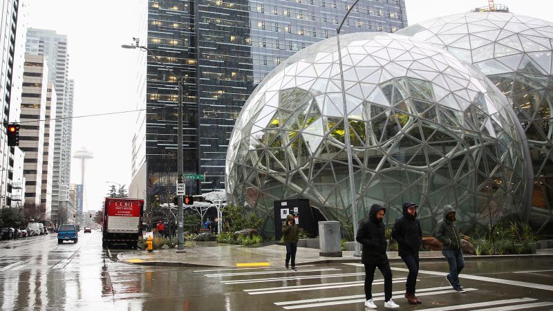 NextImg:Amazon to require office workers to show up in person at least three days a week | CNN Business