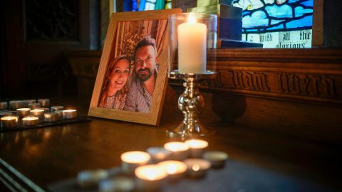 Candles illuminate a photo of missing woman Nicola Bulley and her partner, Paul Ansell, at St Michael's Church in St Michael's on Wyre.