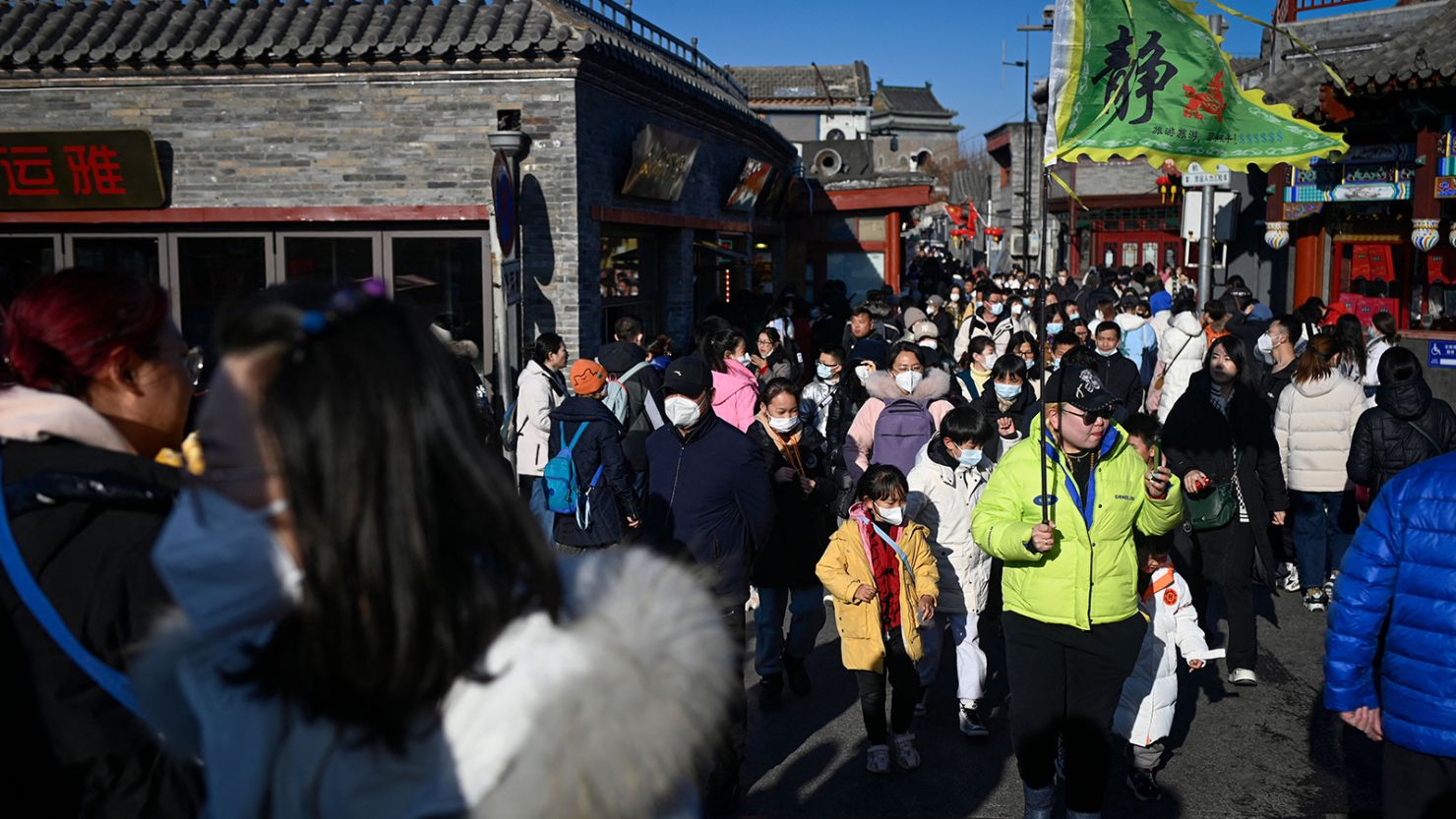 Tourists visit a historic district in Beijing on January 31, 2023. 