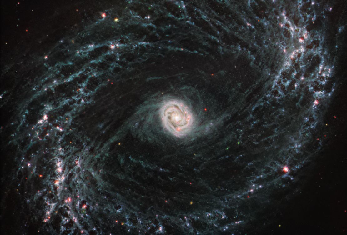 The James Webb Space Telescope took this image of NGC 1433, a barred spiral galaxy with a bright core surrounded by double star-forming rings. 