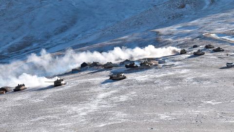 In this photograph provided by the Indian Army, tanks pull back from the banks of Pangong Tso lake region, in Ladakh along the India-China border on Wednesday, Feb. 10, 2021.