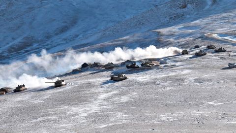 In this photograph provided by the Indian Army, tanks pull back from the banks of Pangong Tso lake region, in Ladakh along the India-China border on Wednesday, Feb. 10, 2021. 