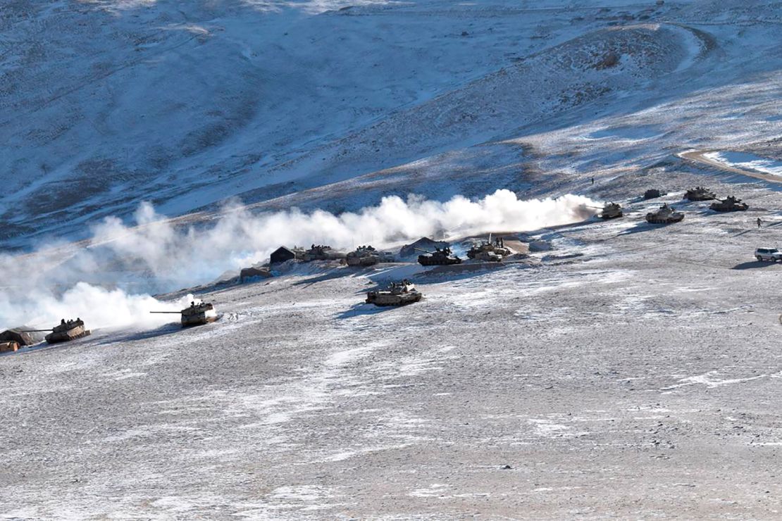 In this photograph provided by the Indian Army, tanks pull back from the banks of Pangong Tso lake region, in Ladakh along the India-China border on Wednesday, Feb. 10, 2021. 