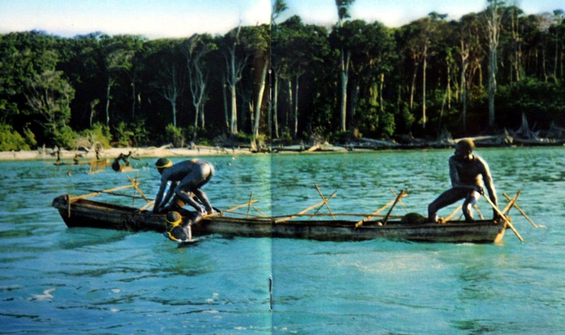 In this undated photo released by the Anthropological Survey of India, Sentinelese tribe men row their canoe in India's Andaman and Nicobar archipelago. 