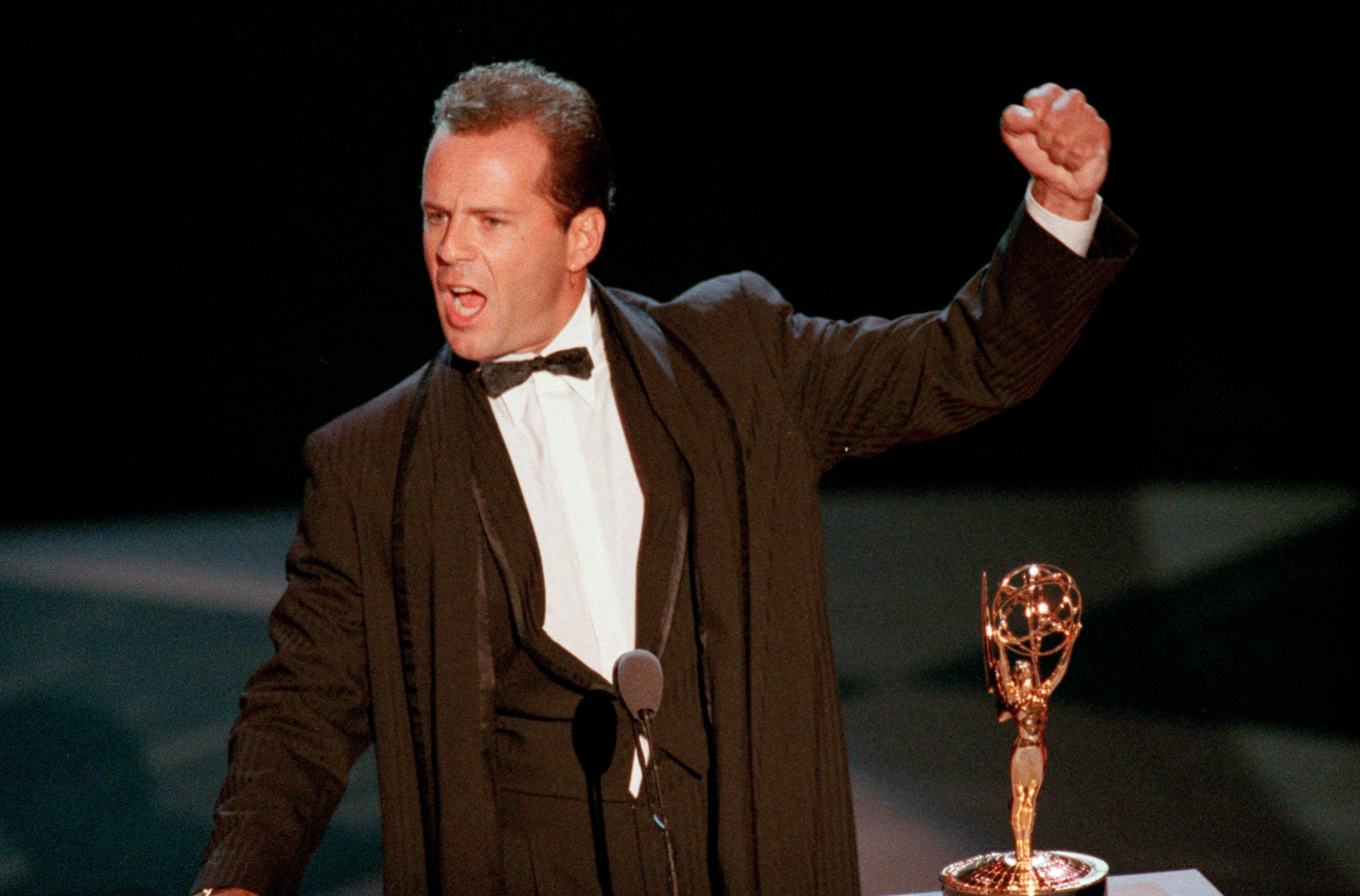 Willis accepts a best actor Emmy Award for 'Moonlighting' in 1987.