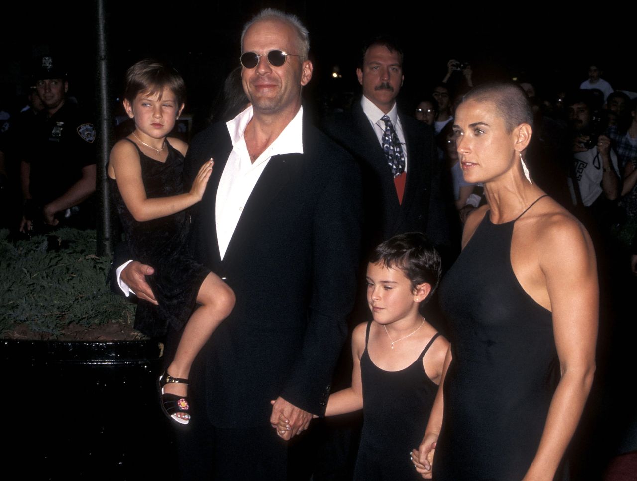 Willis and his family — from left, Scout, Rumer and Moore — attend the premiere of Moore's new movie "Striptease" in 1996.