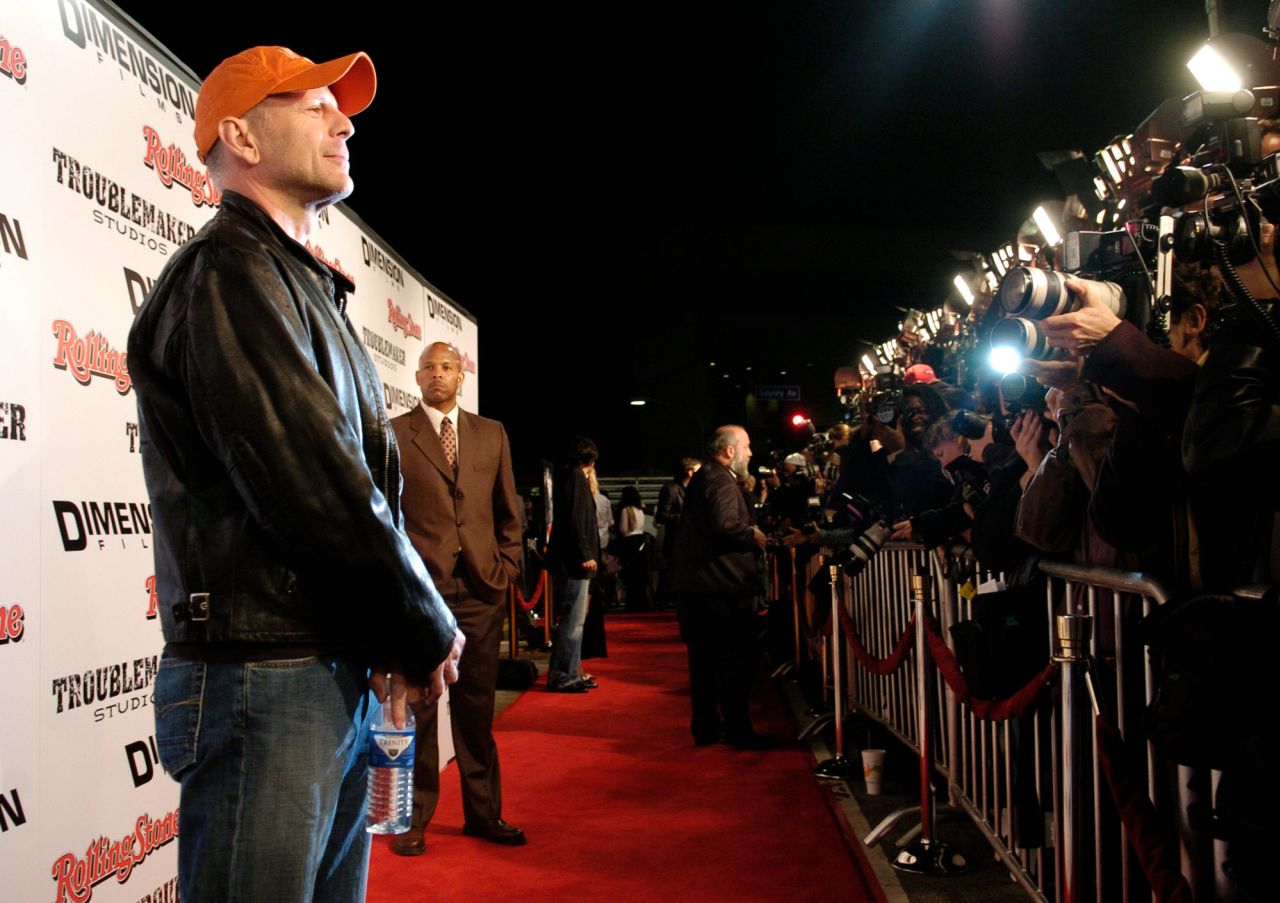 Willis walks the red carpet at the "Sin City" premiere in Los Angeles in 2005.