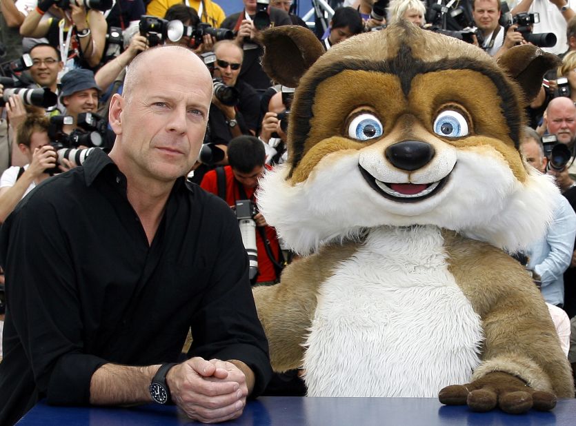 Willis poses with the animal character RJ, who he voices in the 2006 animated film "Over the Hedge."