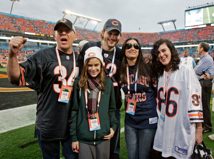 Willis shows his support for the Chicago Bears as he attends the Super Bowl in 2007. He is joined by his daughters Tallulah and Rumer, his ex-wife Moore and Moore's husband, actor Ashton Kutcher.