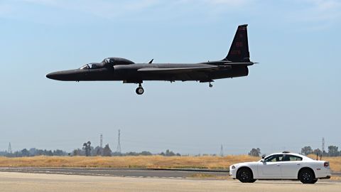 A mobile chase car pursues a U-2 Dragon Lady as it prepares to land at Beale Air Force Base in California in June 2015.