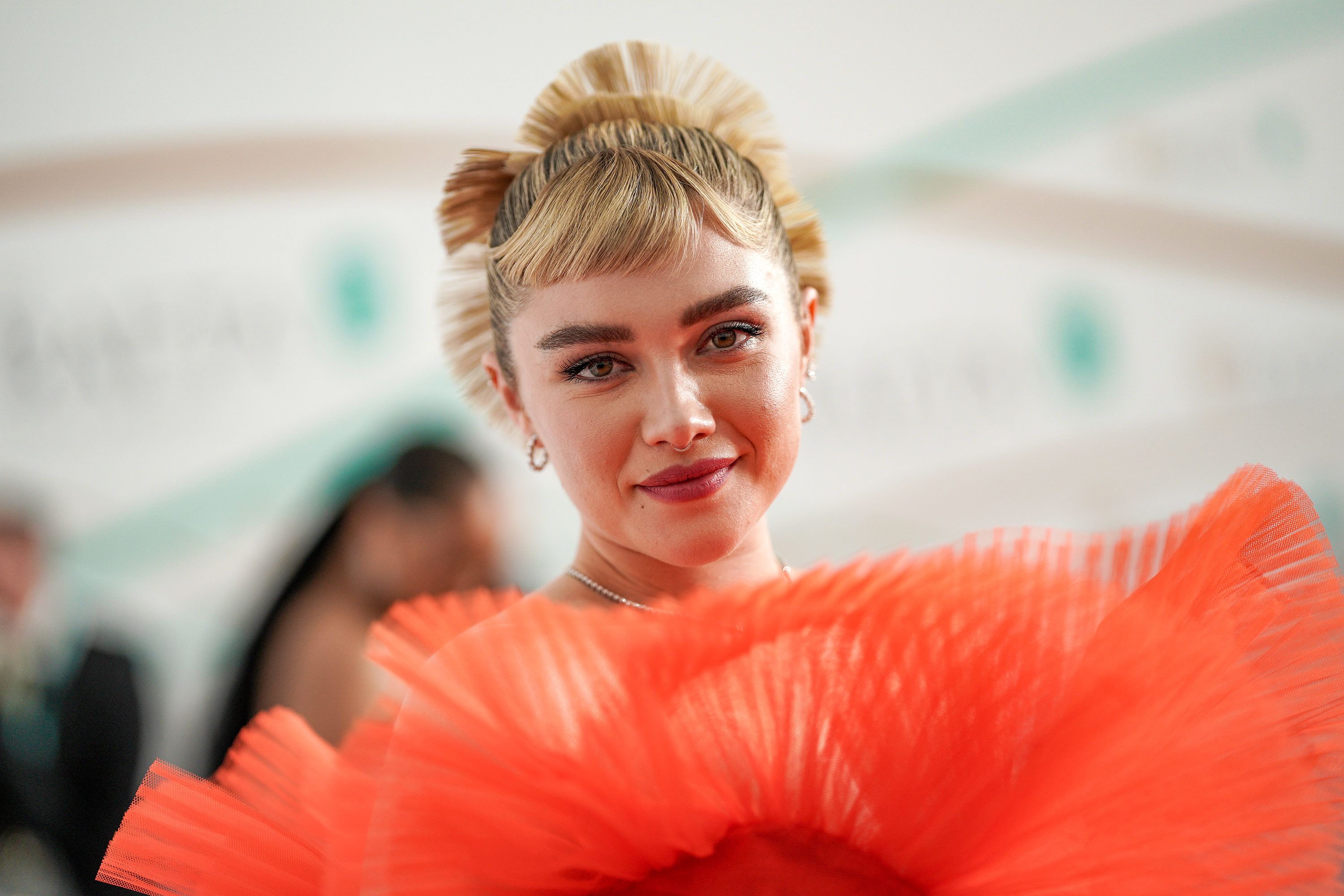 Florence Pugh arrives at the BAFTAs.