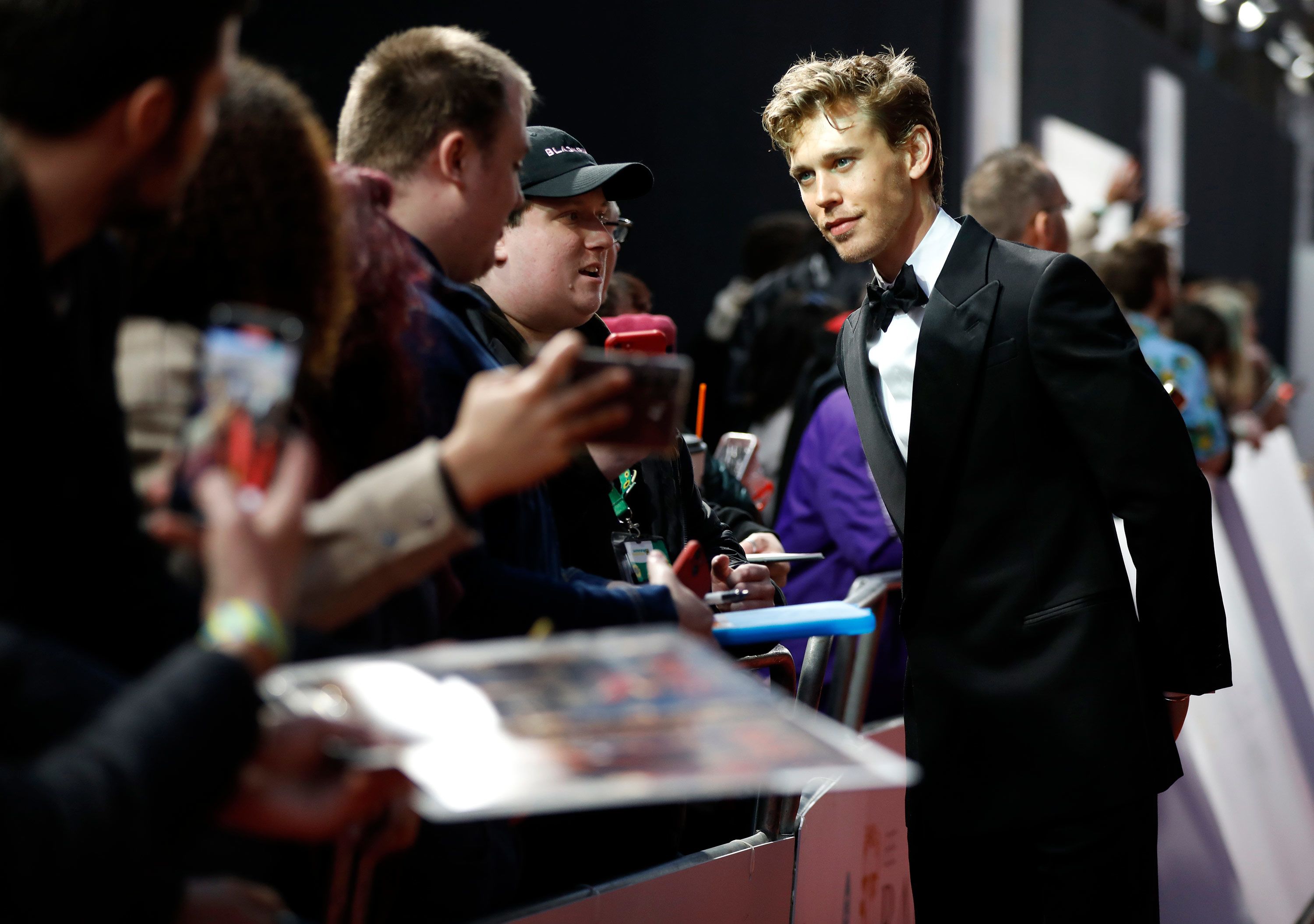 Austin Butler greets fans on the red carpet.