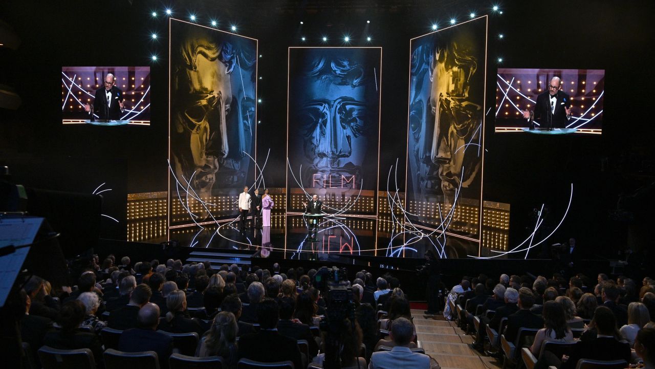 Edward Berger accepts the adapted screenplay award for "All Quiet on the Western Front." 