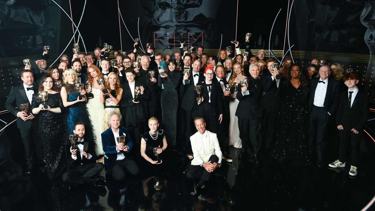 BAFTA winners pose with their awards following the show. 