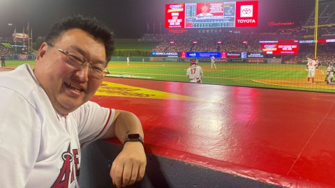 Kotaro Toriumi is one Japanese person who intends to keep traveling overseas: he's pictured here at a Los Angeles Angels baseball game.