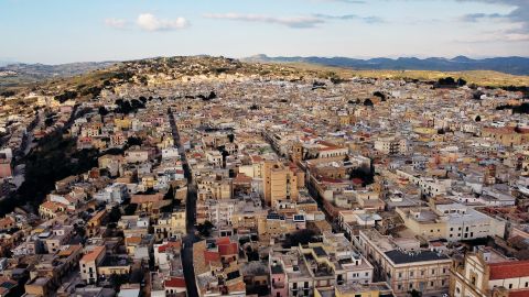 In 1983, Howard Schultz drew inspiration from Milan. Last year, he took notes from Sicily, where olive oil is produced. Partanna, pictured, is a town in Sicily close to Asaro Farm. It's the namesake for the oil used in Oleato. 