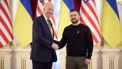 Ukraine's President Volodymyr Zelenskiy and U.S. President Joe Biden shake hands before a meeting, amid Russia's attack on Ukraine, in Kyiv, Ukraine February 20, 2023. Ukrainian Presidential Press Service/Handout via REUTERS ATTENTION EDITORS - THIS IMAGE HAS BEEN SUPPLIED BY A THIRD PARTY.