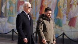 TOPSHOT - US President Joe Biden (L) walks next to Ukrainian President Volodymyr Zelensky (R) as he arrives for a visit in Kyiv on February 20, 2023. - US President Joe Biden made a surprise trip to Kyiv on February 20, 2023, ahead of the first anniversary of Russia's invasion of Ukraine, AFP journalists saw. Biden met Ukrainian President Volodymyr Zelensky in the Ukrainian capital on his first visit to the country since the start of the conflict. (Photo by Dimitar DILKOFF / AFP) (Photo by DIMITAR DILKOFF/AFP via Getty Images)