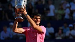 TOPSHOT - Spaniard Carlos Alcaraz celebrates with the trophy after winning the final of ATP 250 Argentina Open against British Cameron Norrie in Buenos Aires on February 19, 2023. (Photo by Luis ROBAYO / AFP) (Photo by LUIS ROBAYO/AFP via Getty Images)