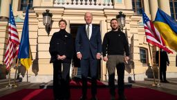 President Joe Biden (C) poses for a photograph with Ukrainian President Volodymyr Zelensky and his wife Olena Zelenska, at Mariinsky Palace during a visit to Kyiv on February 20, 2023. - US President Joe Biden promised increased arms deliveries for Ukraine during a surprise visit to Kyiv on February 20, 2023, in which he also vowed Washington's "unflagging commitment" in defending Ukraine's territorial integrity. (Photo by Evan Vucci / POOL / AFP) (Photo by EVAN VUCCI/POOL/AFP via Getty Images)