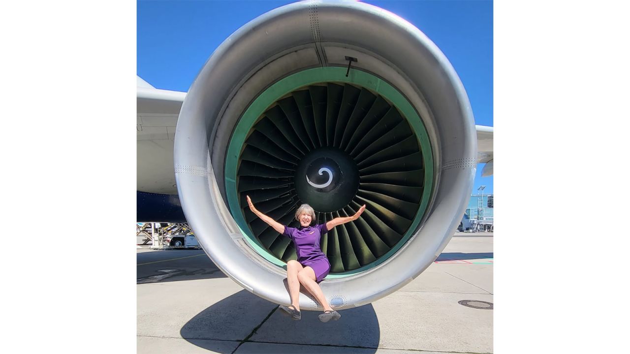 <strong>Frequent flier: </strong>Barbara is 76, and still flies regularly. Here she is posing on a Delta jet last year.