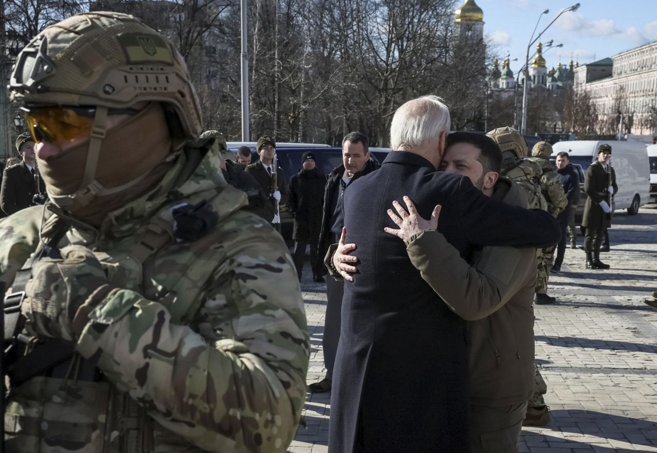 Biden and Zelenskiy embrace after their visit to the Wall of Remembrance in Kyiv.
