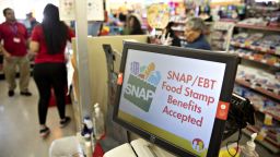 "SNAP/EBT Food Stamp Benefits Accepted" is displayed on a screen inside a Family Dollar Stores Inc. store in Chicago, Illinois, U.S., on Tuesday, March 3, 2020. 